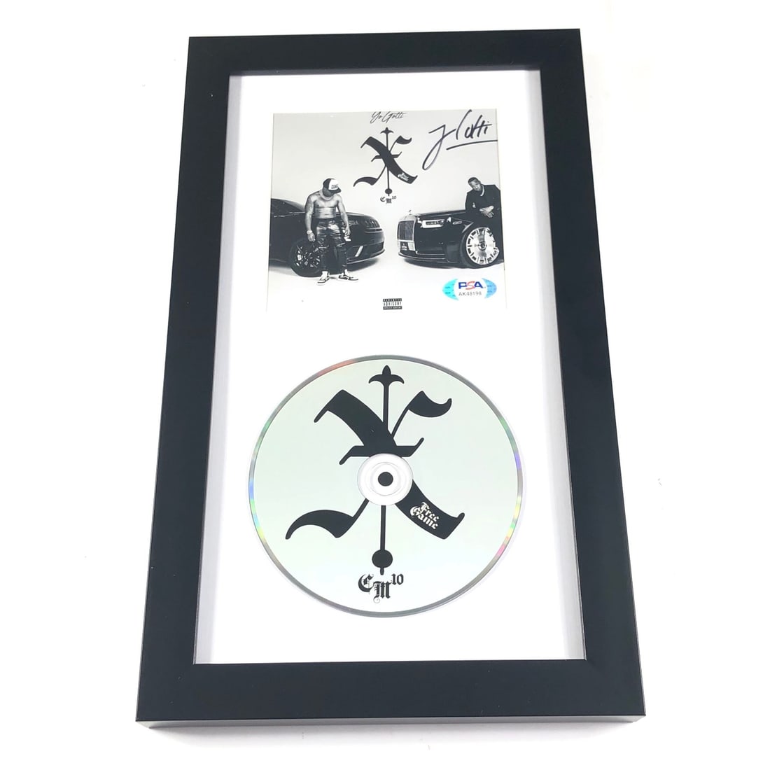 Yo Gotti Free Game Signed Framed CD Cover PSA/DNA Authenticated: Yo Gotti Free Game Signed Framed CD Cover PSA/DNA Authenticated This listing features a framed CD album cover of 'Free Game' signed by the renowned artist Yo Gotti. The autograph has been authenticate