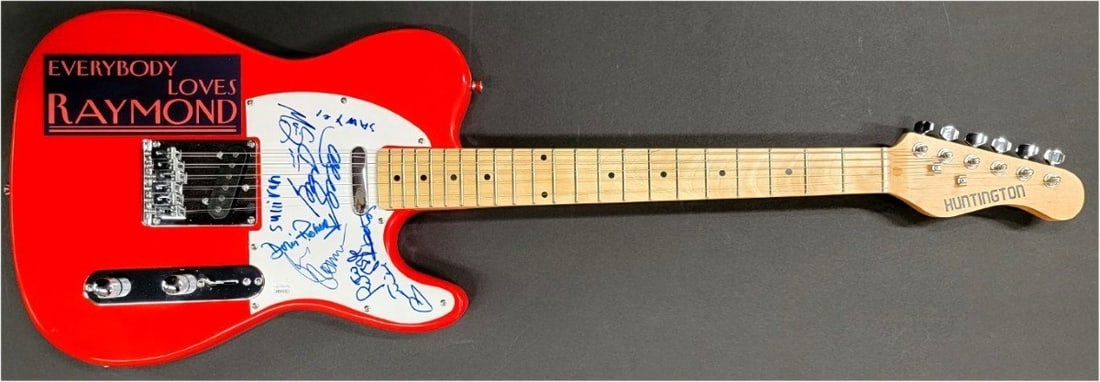 Everybody Loves Raymond Signed Guitar JSA Authenticated Cast Autographs: Everybody Loves Raymond Signed Guitar JSA Authenticated Cast Autographs Celebrate the beloved TV series with this original signed guitar by the cast of Everybody Loves Raymond. The guitar features aut