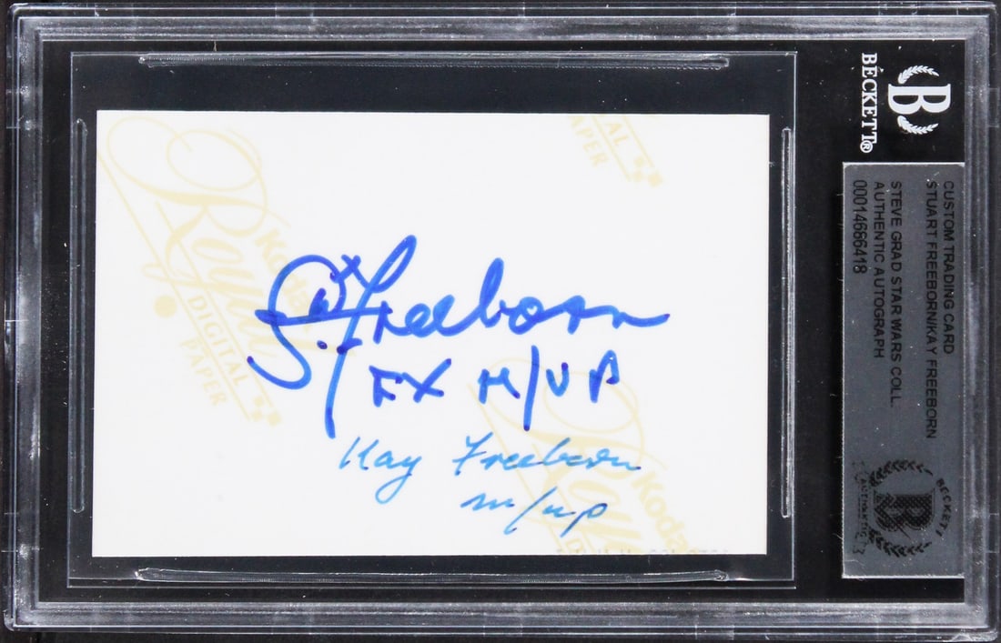 Star Wars Signed Trading Card by Stuart & Kay Freeborn BAS Slabbed: Star Wars Signed Trading Card by Stuart & Kay Freeborn BAS Slabbed This custom trading card features the authentic signatures of Stuart Freeborn and Kay Freeborn, renowned for their work on the Star W