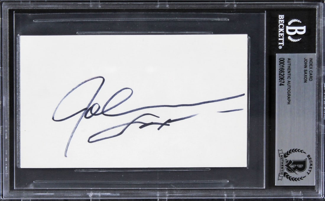 John Saxon Signed 3x5 Index Card Portrait in Black Beckett Authenticated: John Saxon Signed 3x5 Index Card Portrait in Black Beckett Authenticated This authentic 3x5 index card features the signature of John Saxon, known for his role in 'Portrait in Black.' The card is slab