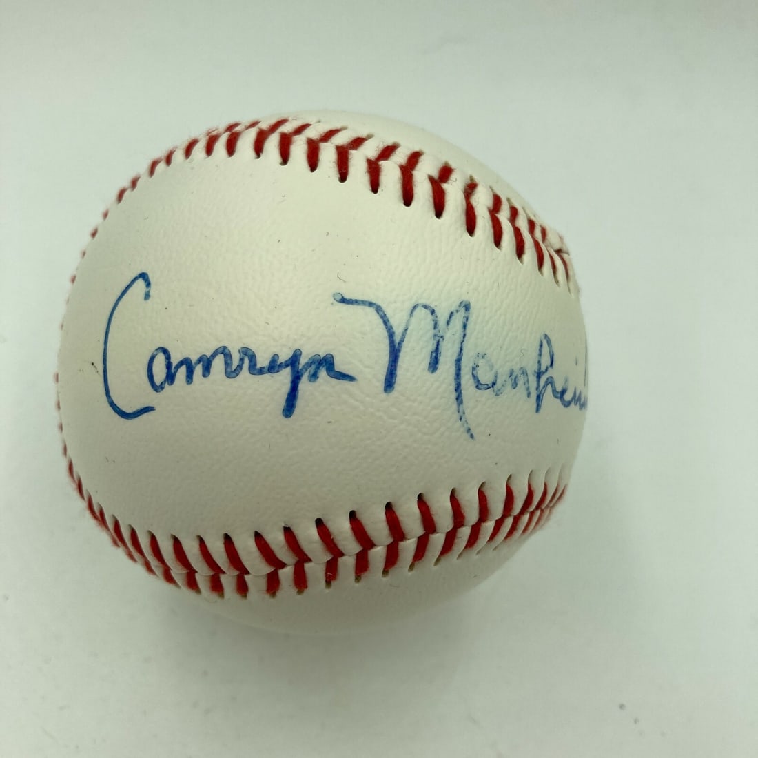 Camryn Manheim Autographed Baseball with JSA Certification: Camryn Manheim Autographed Baseball with JSA Certification This is an original signed autographed baseball by Camryn Manheim, a notable movie star. The baseball comes with a James Spence Authenticatio