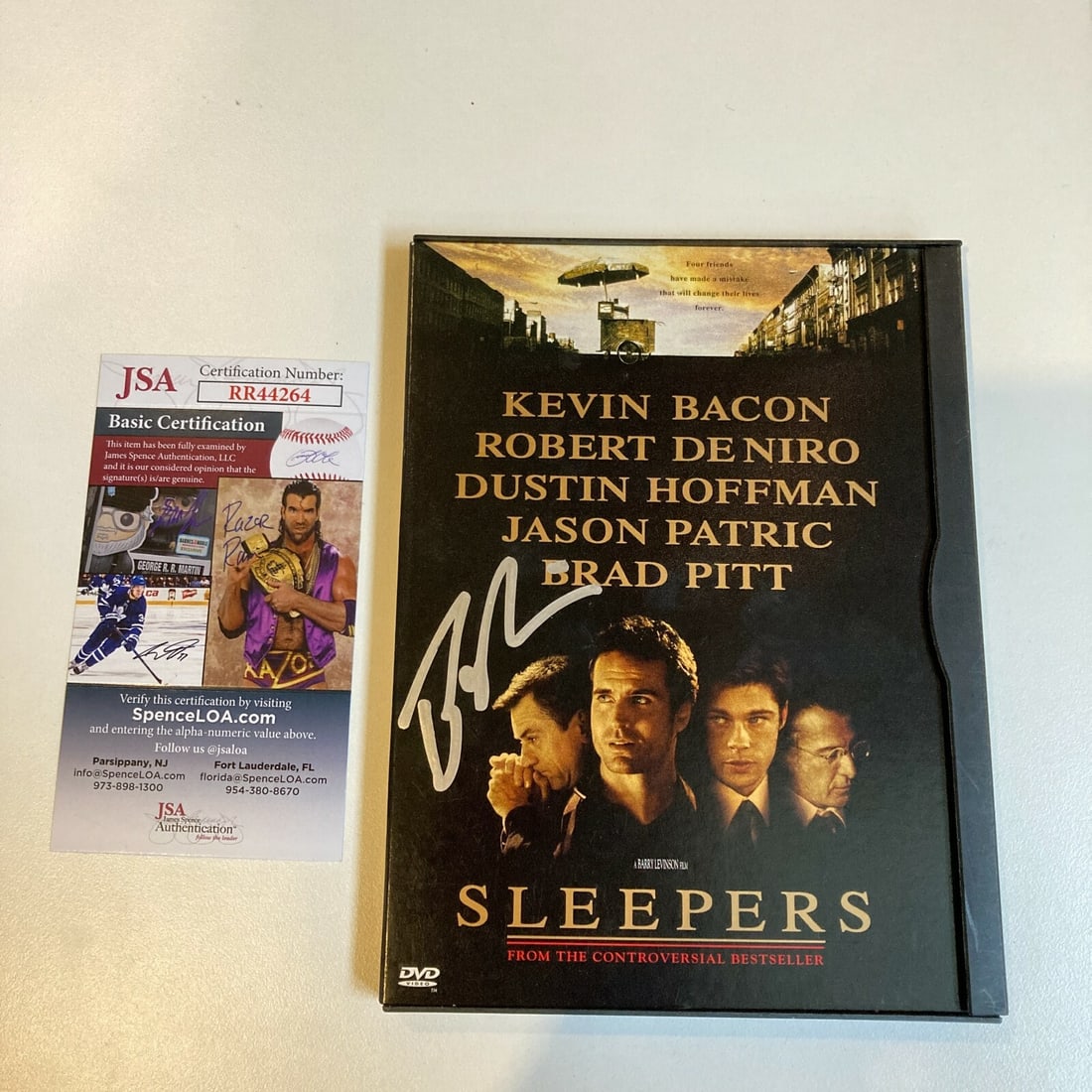 Barry Levinson Signed Sleepers DVD with JSA Certification: Barry Levinson Signed Sleepers DVD with JSA Certification This collectible features a signed DVD cover of the film 'Sleepers' by acclaimed director Barry Levinson. The autograph has been authenticated
