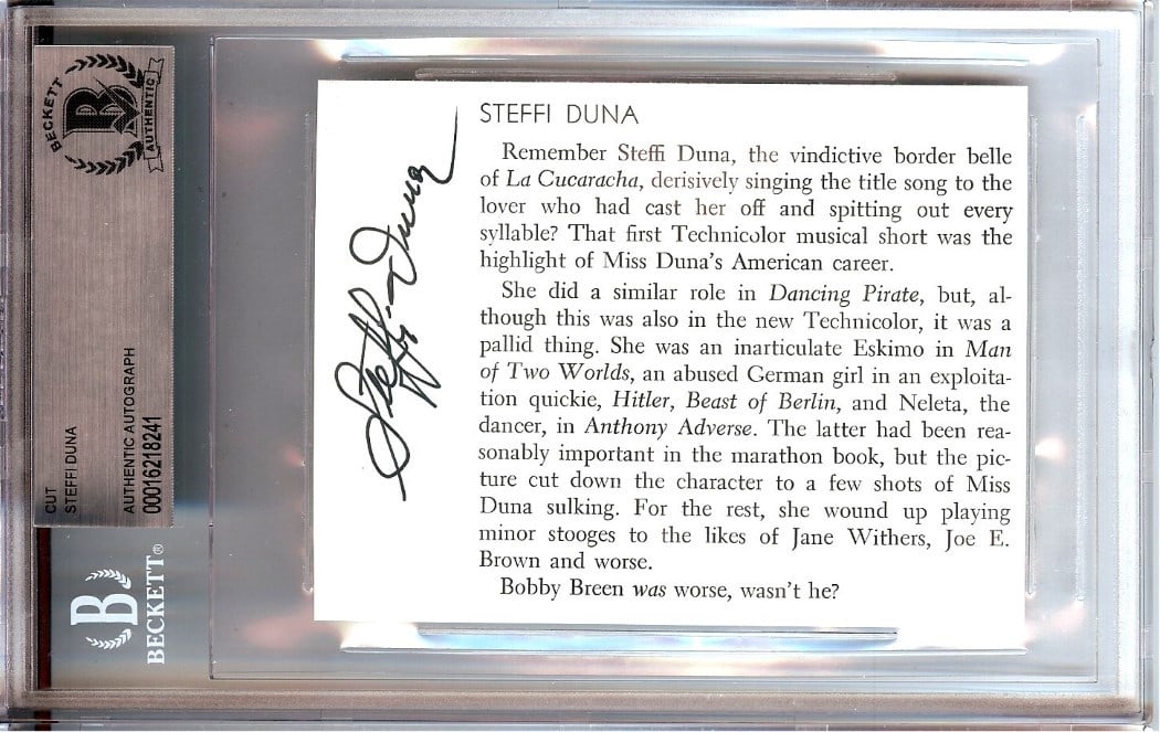 Steffi Duna Autograph Cut Signature Encased Beckett Authenticated: Steffi Duna Autograph Cut Signature Encased Beckett Authenticated This is an original autographed cut signature card signed by Steffi Duna, best known for her role in "La Cucaracha." The autograph has