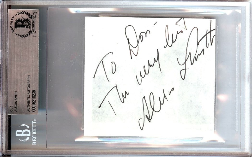 Autographed Alexis Smith Cut Signature Card Encased by Beckett Authentication: Autographed Alexis Smith Cut Signature Card Encased by Beckett Authentication This item is an original autographed cut signature by singer and actress Alexis Smith. The signature has been authenticate