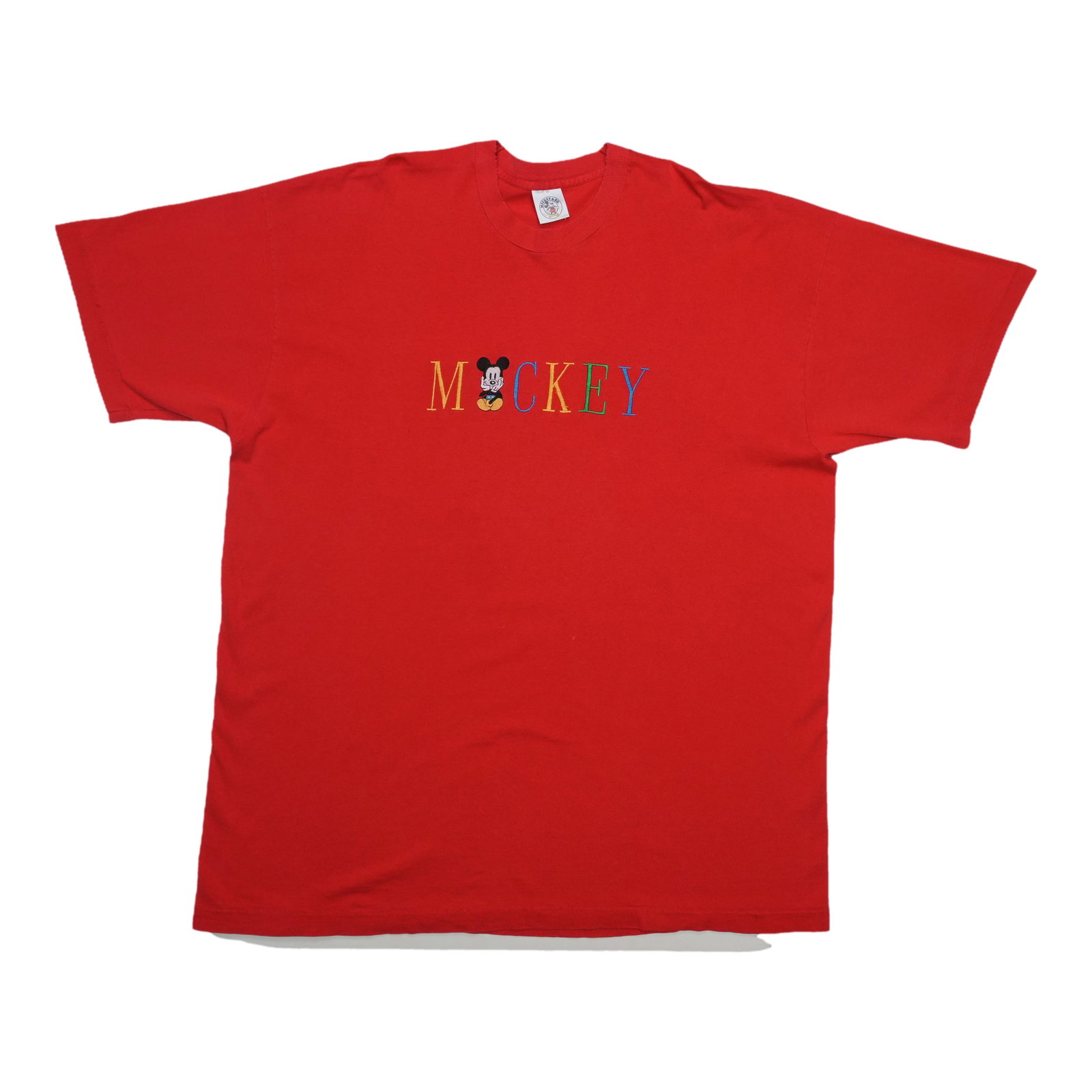 Vintage 1990s Red Disney Mickey Mouse Tee: Vintage 1990s Red Disney Mickey Mouse Tee This is an original vintage 1990s Disney Mickey Mouse shirt in red. It is a true vintage piece and not a modern reproduction. The shirt features noticeable di