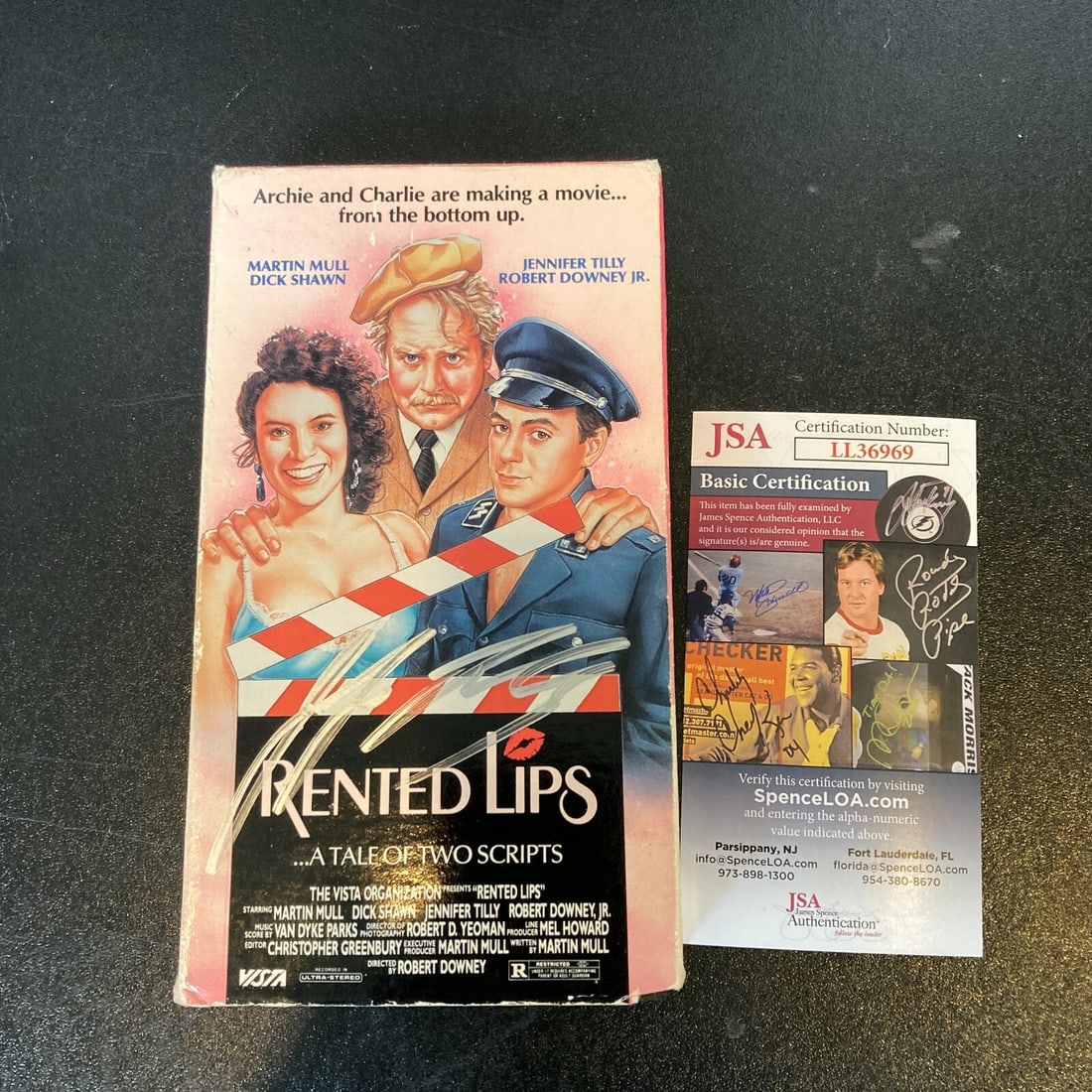Rented Lips VHS Signed by Jennifer Tilly with JSA Authentication: Rented Lips VHS Signed by Jennifer Tilly with JSA Authentication This is an original "Rented Lips" VHS movie signed by Jennifer Tilly. The autograph has been authenticated by James Spence Authenticati