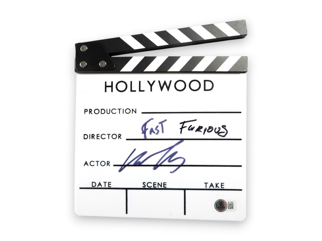 Michelle Rodriguez Signed Clapper Fast and Furious Beckett Authenticated: Michelle Rodriguez Signed Clapper Fast and Furious Beckett Authenticated This authentic movie clapper, signed by Michelle Rodriguez, is a must-have for fans of the Fast and Furious franchise. The auto