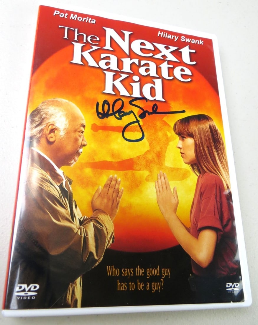The Next Karate Kid DVD Cover Signed by Hilary Swank JSA Authenticated: The Next Karate Kid DVD Cover Signed by Hilary Swank JSA Authenticated This is an original DVD cover for 'The Next Karate Kid' autographed by Hilary Swank. The signature has been authenticated by Jame