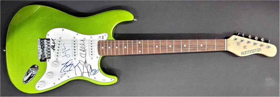 JSA Authenticated Guitar Signed by Big Bang Theory Full Cast: JSA Authenticated Guitar Signed by Big Bang Theory Full Cast This guitar and guitar pick set is autographed by cast members of The Big Bang Theory, including Jim Parsons, Kaley Cuoco, Simon Helberg, K