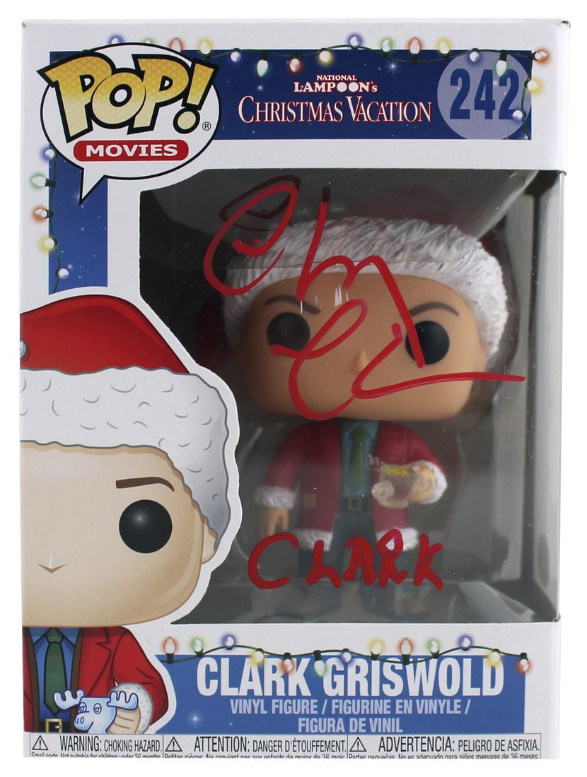 Clark Griswold Funko Pop Signed by Chevy Chase Beckett COA Christmas Vacation: Clark Griswold Funko Pop Signed by Chevy Chase Beckett COA Christmas Vacation This is a pre-owned Funko Pop Vinyl Figure (#242) featuring Clark Griswold from National Lampoon's Christmas Vacation. The