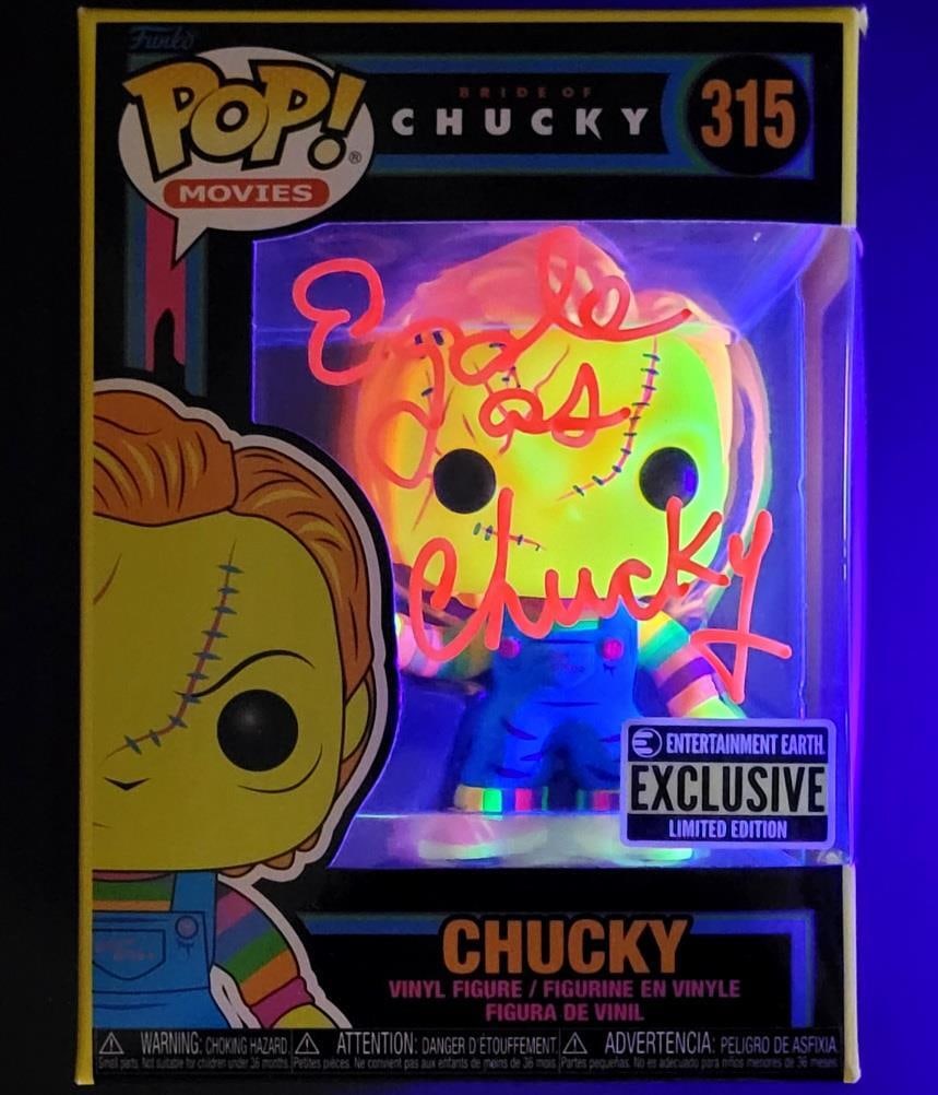 Child's Play Ed Gale Signed Blacklight Chucky Funko Pop Beckett Authenticated: Child's Play Ed Gale Signed Blacklight Chucky Funko Pop Beckett Authenticated This is a pre-owned Blacklight Chucky Funko Pop! figure, personally signed by Ed Gale in pink ink. The signature has been 