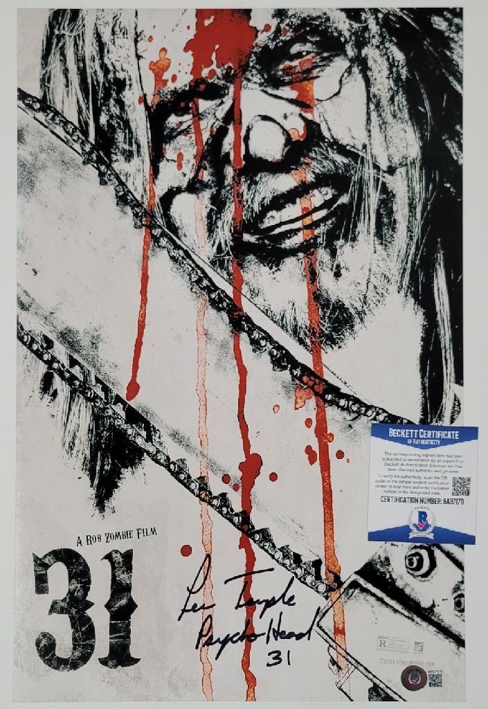 Signed 11x17 Psycho Head 31 Movie Poster Photo by Lew Temple Beckett Authenticated: Signed 11x17 Psycho Head 31 Movie Poster Photo by Lew Temple Beckett Authenticated This is an original 11x17 movie poster photograph signed by Lew Temple as "Psycho Head" from the film 31. The autogra