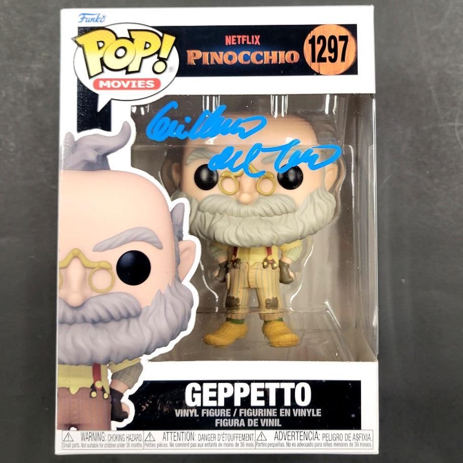 Funko Pop Geppetto from Pinocchio Signed by Guillermo Del Toro Beckett Authenticated: Funko Pop Geppetto from Pinocchio Signed by Guillermo Del Toro Beckett Authenticated This original Geppetto Funko Pop! collectible from the movie Pinocchio features an autograph by Guillermo Del Toro.