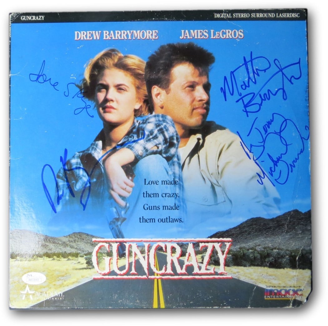 Guncrazy Laserdisc Sleeve Signed by Drew Barrymore and Cast JSA Authenticated: Guncrazy Laserdisc Sleeve Signed by Drew Barrymore and Cast JSA Authenticated This is an original Laserdisc cover from the film Guncrazy, autographed by cast members including Drew Barrymore, Michael 