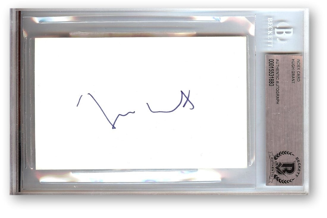 Index Card Signed by Hugh Grant with Beckett Authentication: Index Card Signed by Hugh Grant with Beckett Authentication This is an original index card autographed by Hugh Grant, known for his roles in "Notting Hill" and "Love Actually." The autograph has been 