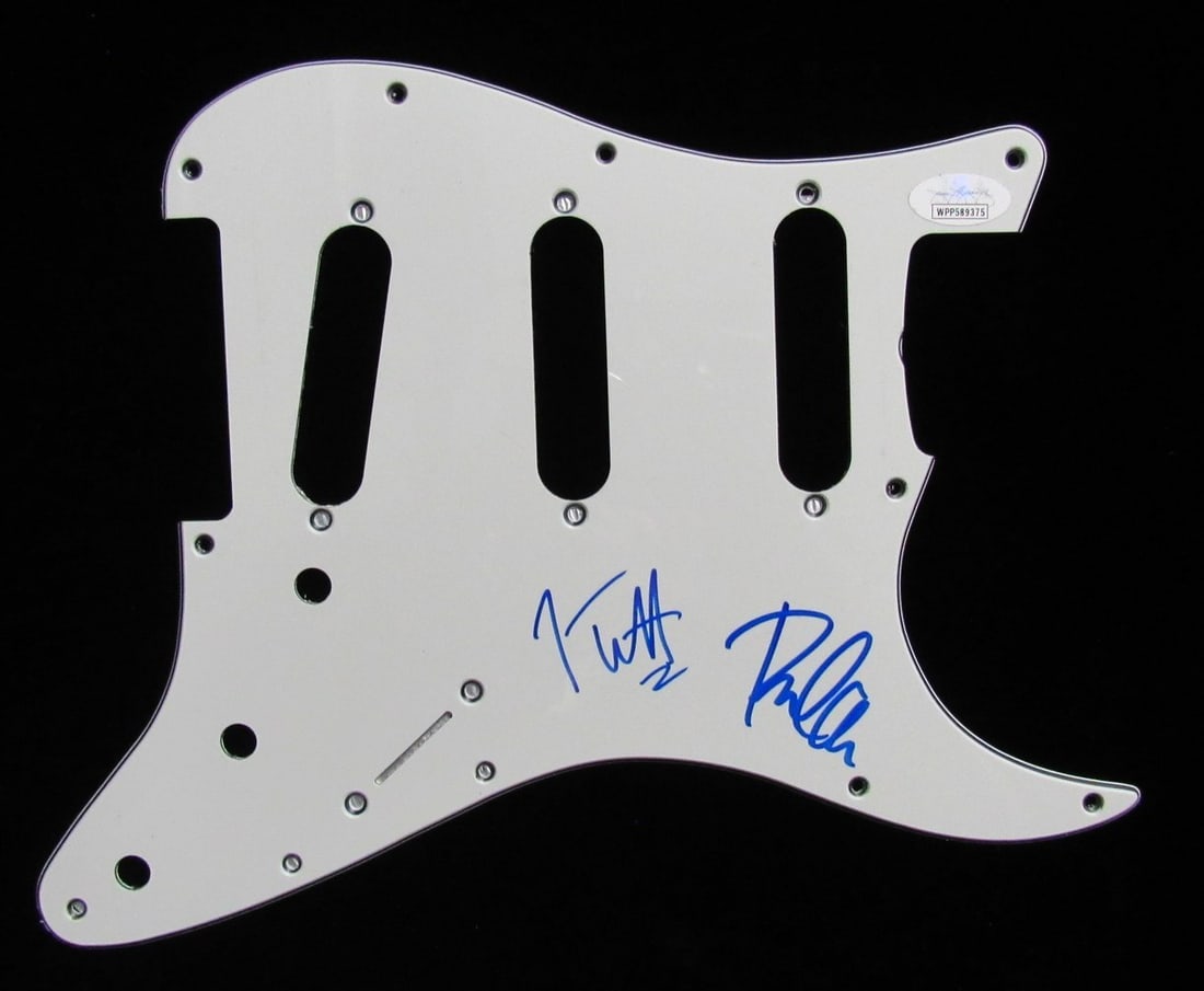 Guitar Pick Guard Signed by Def Leppard's Joe Elliott and Phil Collen with JSA COA: Guitar Pick Guard Signed by Def Leppard's Joe Elliott and Phil Collen with JSA COA This is an original guitar pick guard hand-signed by Joe Elliott and Phil Collen of Def Leppard. The autographs are a