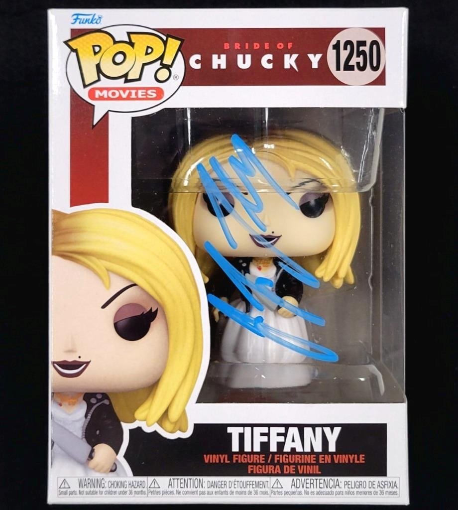 Tiffany Funko Pop Bride of Chucky signed by Jennifer Tilly Beckett authenticated: Tiffany Funko Pop Bride of Chucky signed by Jennifer Tilly Beckett authenticated This Bride of Chucky Tiffany Funko Pop features an authentic signature by Jennifer Tilly. The autograph is verified by 