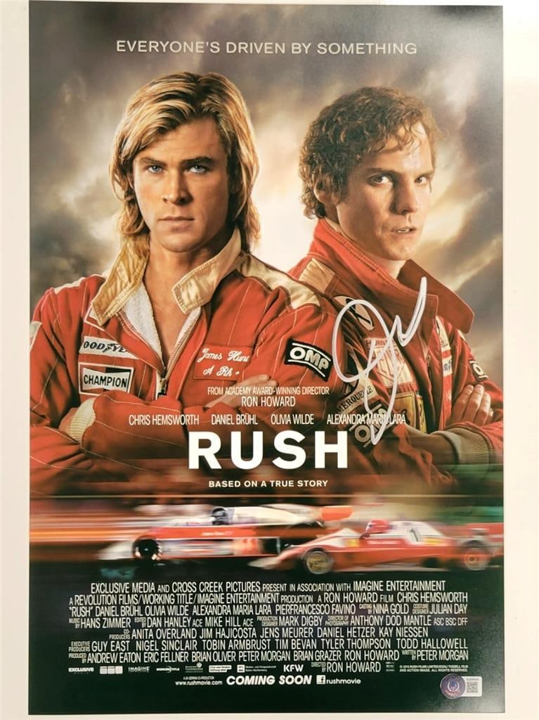 Daniel Bruhl Signed Rush 12x18 Photo Beckett Authenticated: Daniel Bruhl Signed Rush 12x18 Photo Beckett Authenticated This is an original 12x18 photograph poster of the movie 'Rush,' signed by actor Daniel Bruhl. The autograph has been authenticated by Becket