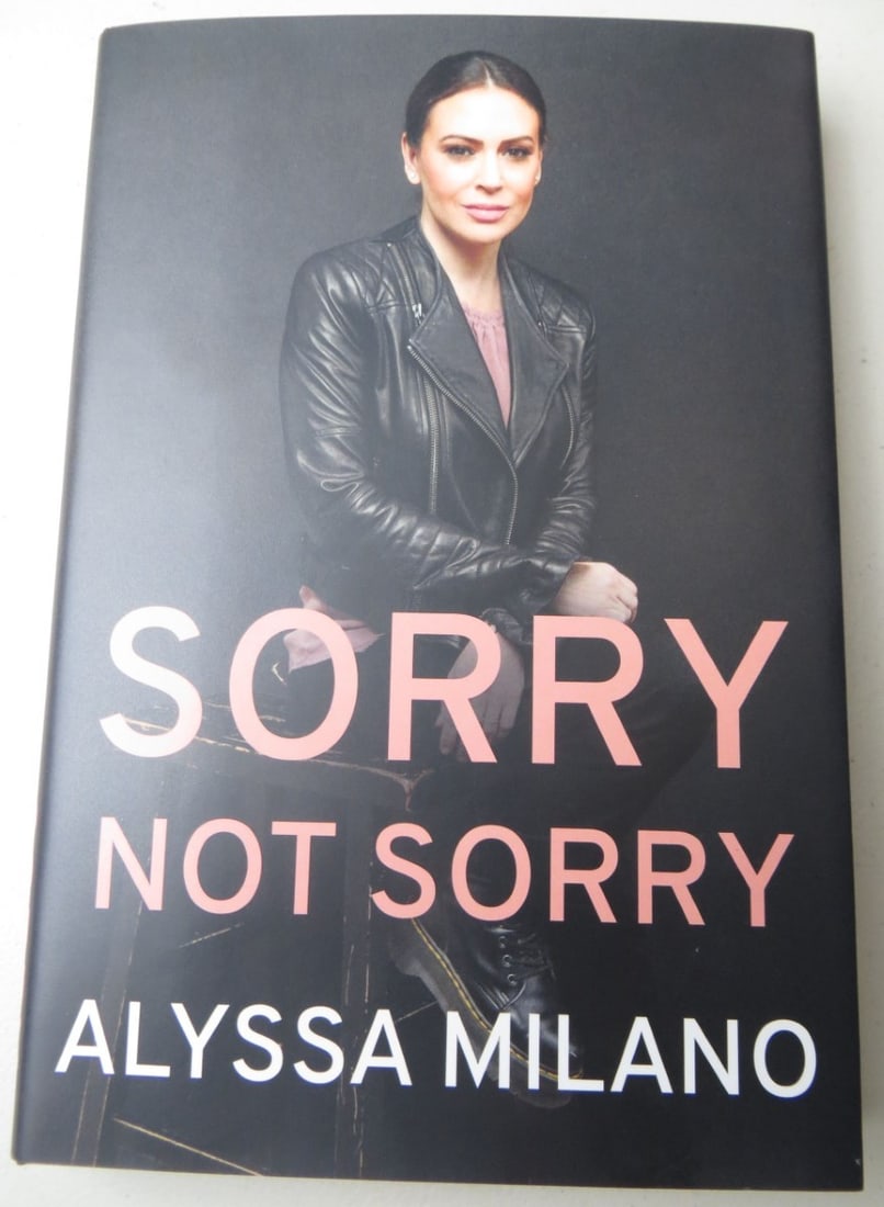 Alyssa Milano Signed Sorry Not Sorry Book JSA Authenticated: Alyssa Milano Signed Sorry Not Sorry Book JSA Authenticated This is an authentic hardcover book titled "Sorry Not Sorry" signed by Alyssa Milano, known for her role in the iconic series Charmed. The b