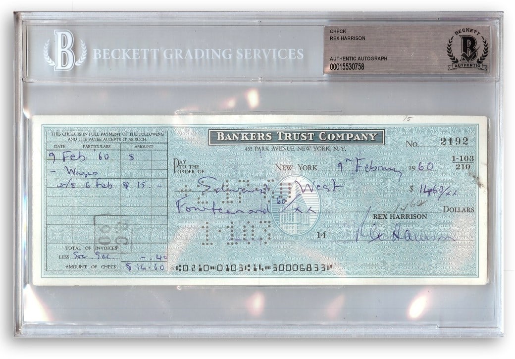 Rex Harrison Signed Bank Check Authenticated by Beckett BAS Slabbed: Rex Harrison Signed Bank Check Authenticated by Beckett BAS Slabbed This is an original bank check autographed by Rex Harrison, renowned actor and singer best known for his role in "My Fair Lady." The