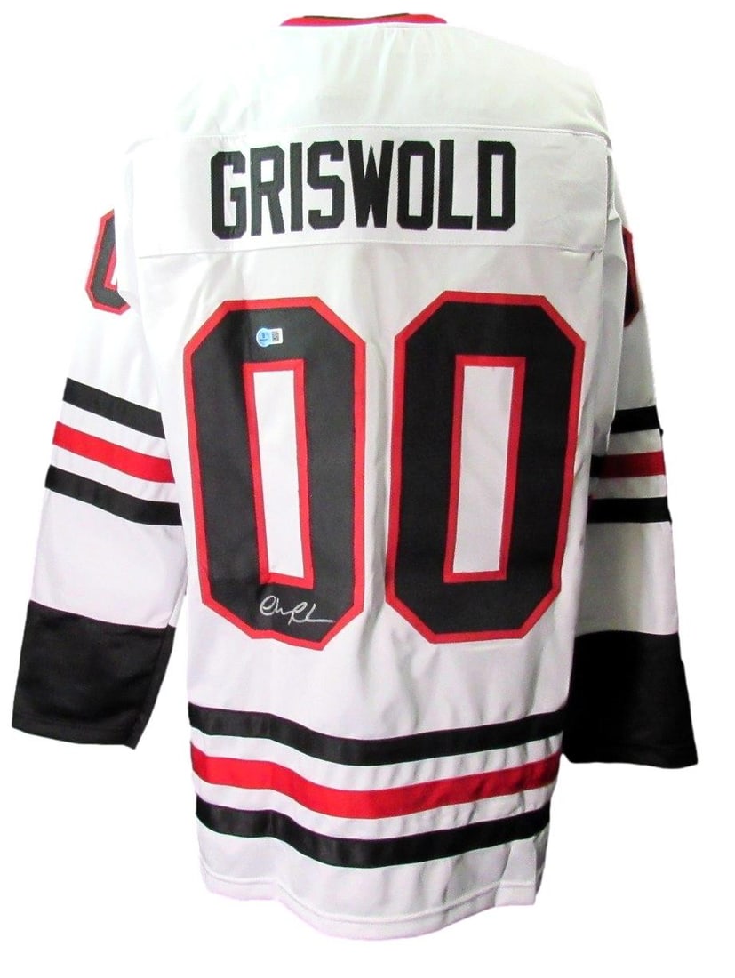 Chevy Chase Autographed Christmas Vacation XL Hockey Jersey Beckett Authenticated: Chevy Chase Autographed Christmas Vacation XL Hockey Jersey Beckett Authenticated Celebrate the holiday season with this authentic Chevy Chase "Family Christmas" Clark Griswold signed white XL hockey 