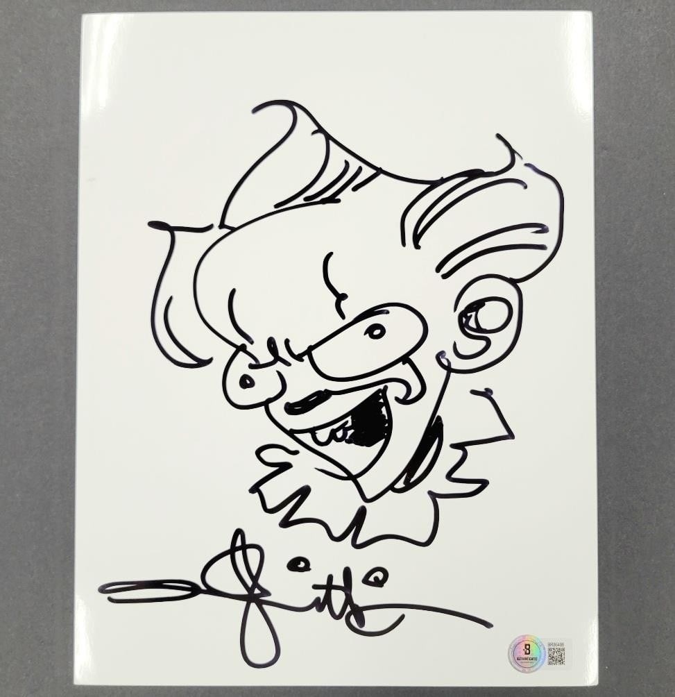 8.5x11 IT Pennywise sketch signed by Andy Muschietti with Beckett authentication: 8.5x11 IT Pennywise sketch signed by Andy Muschietti with Beckett authentication This is an original 8.5x11 inch photograph featuring a sketch of Pennywise from the movie "It," hand-signed by Andy Mus