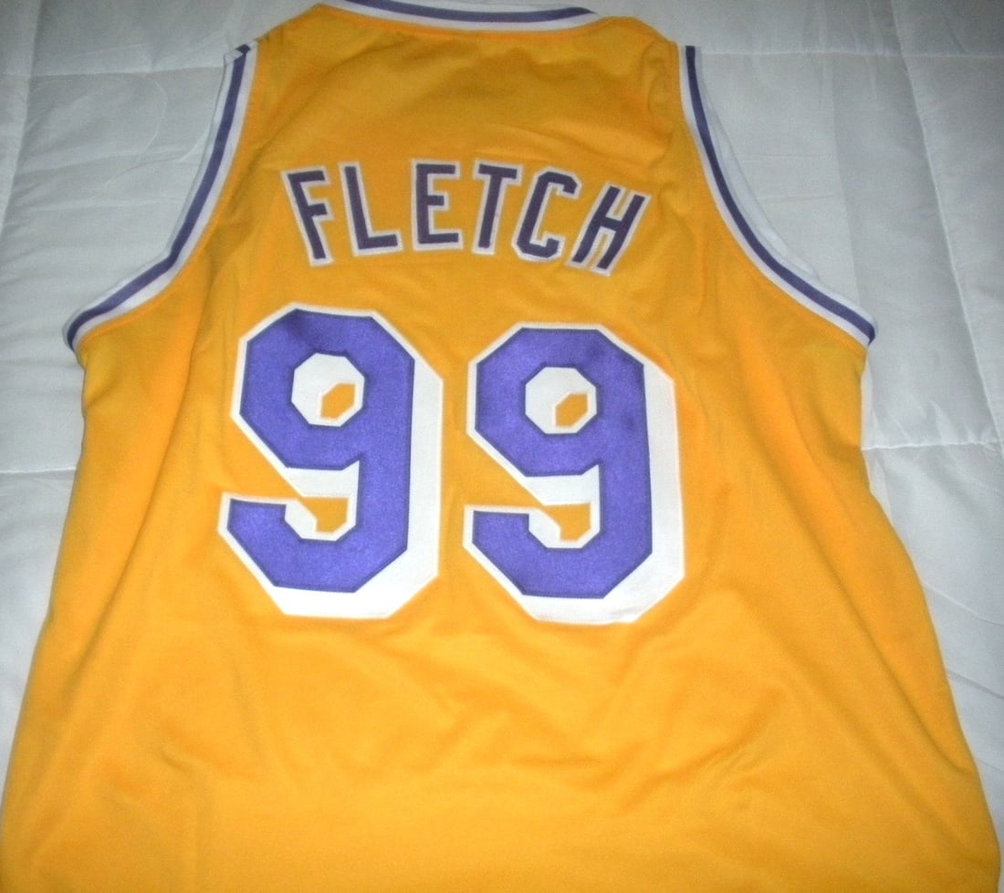 Unsigned yellow custom Chevy Chase Fletch jersey: Unsigned yellow custom Chevy Chase Fletch jersey This is a pre-owned custom yellow jersey inspired by the character Fletch, famously portrayed by Chevy Chase. The jersey is original and originates fro