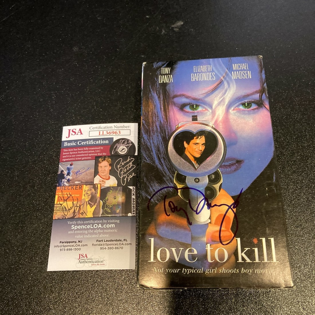 Tony Danza Autographed Love To Kill VHS with JSA COA: Tony Danza Autographed Love To Kill VHS with JSA COA This is an original VHS copy of the movie "Love To Kill," signed by Tony Danza. The autograph has been authenticated by James Spence Authentication