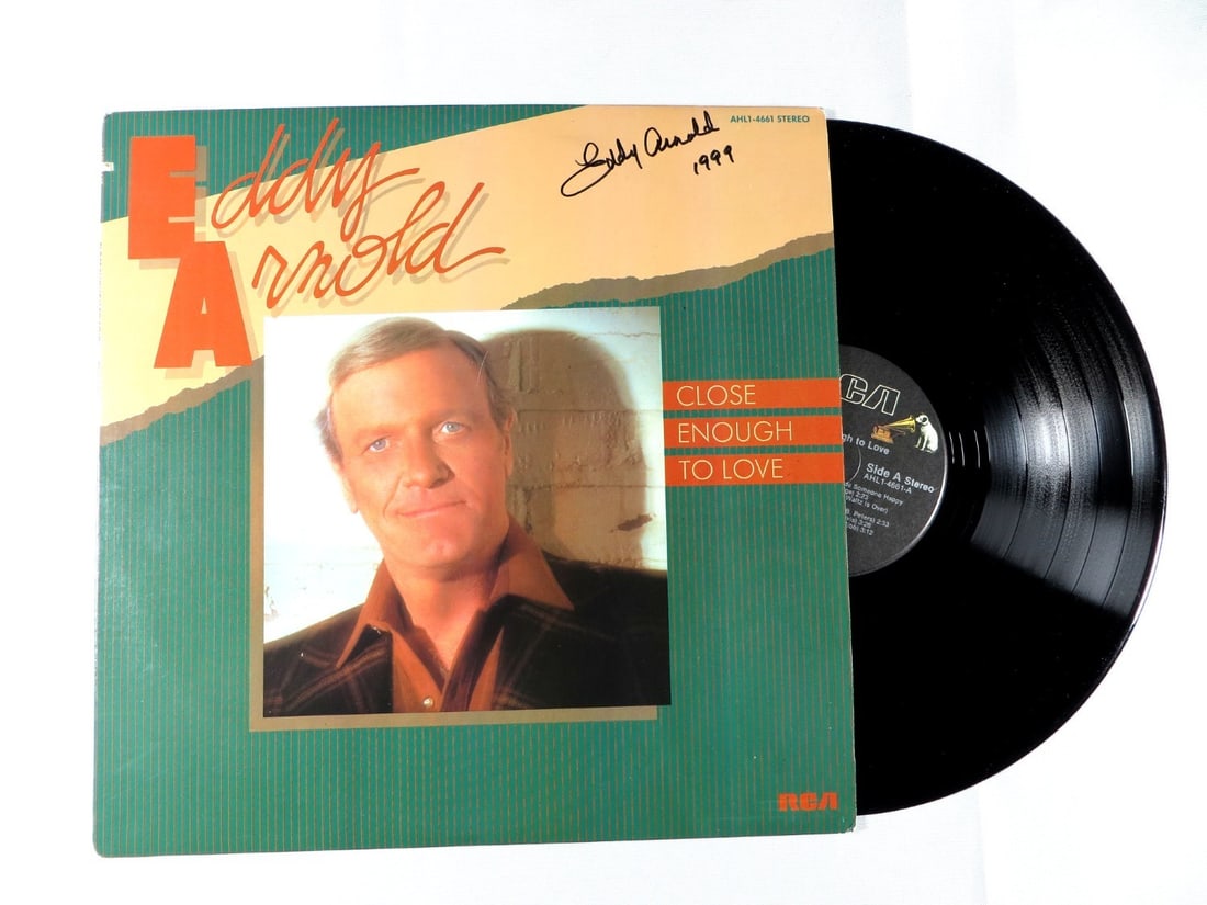 Eddy Arnold Album Cover with Beckett Authenticated Signature: Eddy Arnold Album Cover with Beckett Authenticated Signature This is an original album cover for "Close Enough to Love" autographed by Eddy Arnold. The item includes the record(s), though they have no