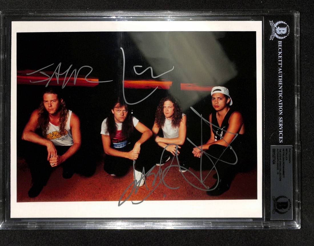 Metallica Signed 8x10 Photo Hetfield Ulrich Hammett Beckett 10 Autograph Grade: Metallica Signed 8x10 Photo Hetfield Ulrich Hammett Beckett 10 Autograph Grade This is an original 8x10 color photograph from the early 1990s, autographed by Metallica band members James Hetfield, Lar