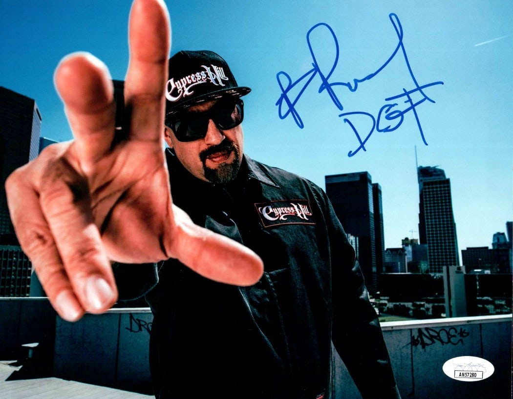 B-Real Autographed 8X10 Photo Cypress Hill JSA Certified: B-Real Autographed 8X10 Photo Cypress Hill JSA Certified This is an original 8x10 photo autographed by B-Real of Cypress Hill, showcasing a close-up image. The autograph is authenticated by James Spen