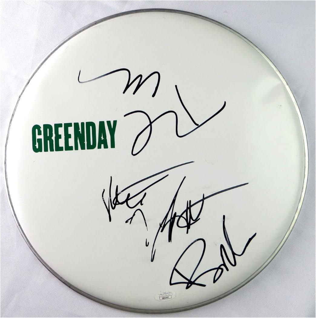 Green Day Autographed 14 Drumhead Armstrong Tre Cool Dirnt JSA Certified: Green Day Autographed 14 Drumhead Armstrong Tre Cool Dirnt JSA Certified This authentic 14" drumhead features the signatures of Green Day band members Billie Joe Armstrong, Tre Cool, and Mike Dirnt. I