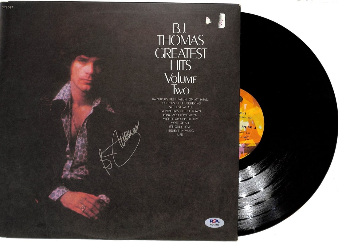 B.J. Thomas Signed Greatest Hits Vol Two Record With PSA DNA Authentication: B.J. Thomas Signed Greatest Hits Vol Two Record With PSA DNA Authentication This is an original "Greatest Hits Vol Two" album autographed by B.J. Thomas. The signature has been authenticated by PSA/DN