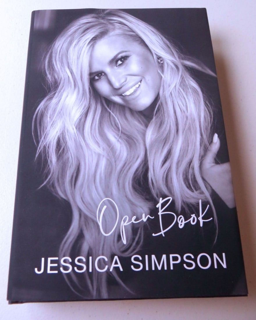 Jessica Simpson Signed Hardcover Open Book with JSA Authentication: Jessica Simpson Signed Hardcover Open Book with JSA Authentication This is a pre-owned hardcover edition of "Open Book" signed by Jessica Simpson. The autograph has been authenticated by James Spence 