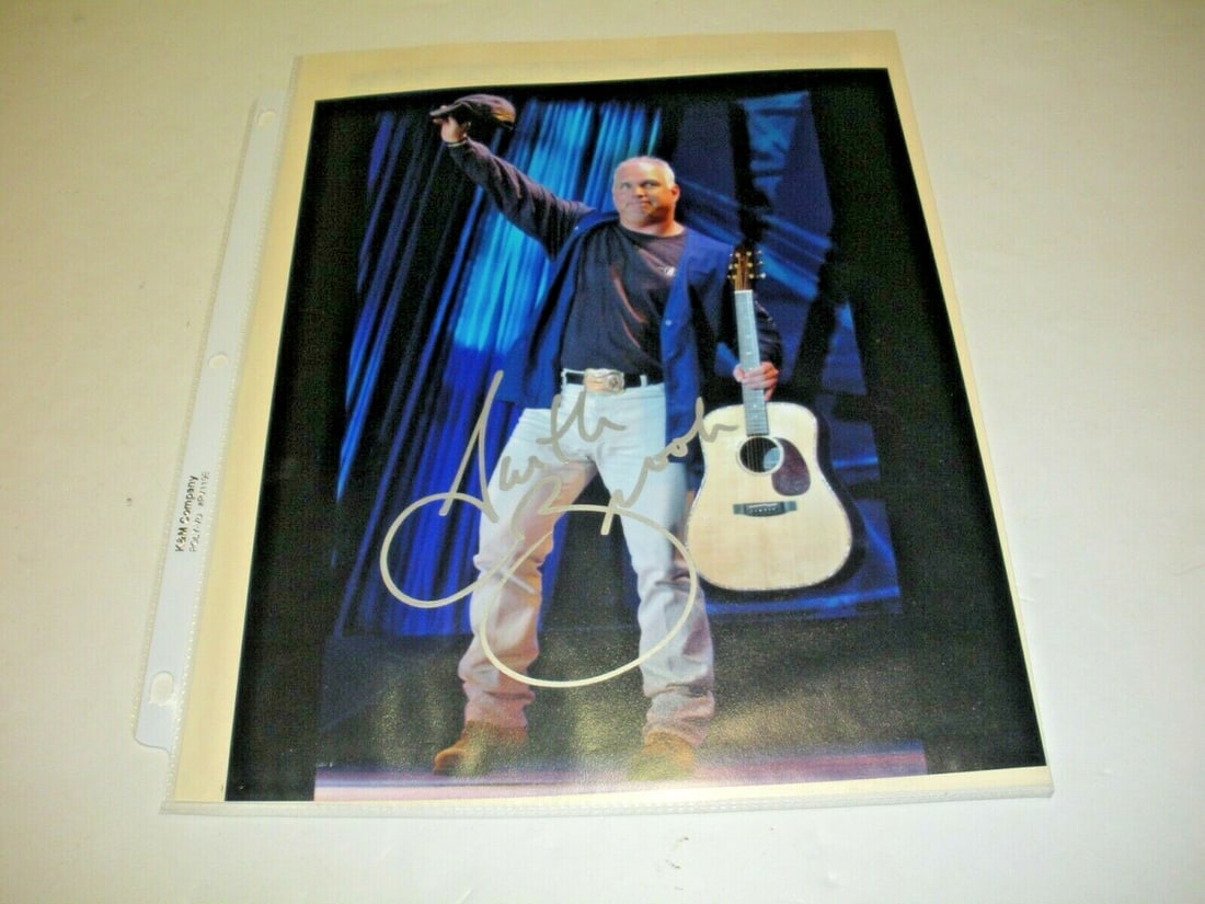 Signed Garth Brooks Friends in Low Places 8x10 Photograph with Todd Mueller COA: Signed Garth Brooks Friends in Low Places 8x10 Photograph with Todd Mueller COA This is an original 8x10 photograph featuring Garth Brooks, signed by the artist. The photo comes with a Certificate of 