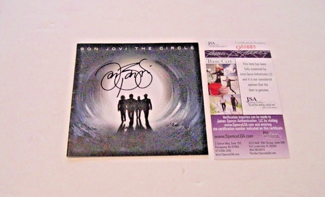 Jon Bon Jovi Signed The Circle CD Cover JSA COA With Booklet: Jon Bon Jovi Signed The Circle CD Cover JSA COA With Booklet This is an original CD cover and booklet for Jon Bon Jovi's "The Circle," signed by the legendary singer. The item is pre-owned and origina