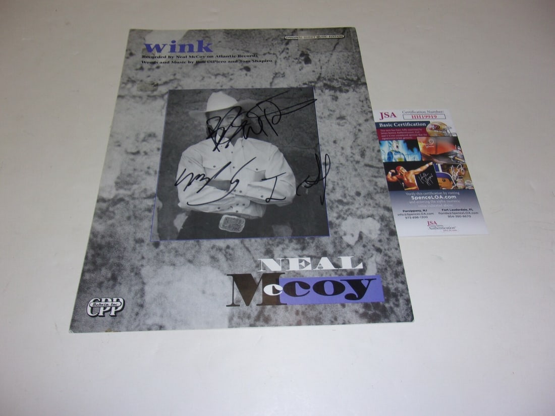 Signed Neal McCoy Wink Sheet Music with Two JSA Authenticated Signatures: Signed Neal McCoy Wink Sheet Music with Two JSA Authenticated Signatures This is an original piece of sheet music signed by Neal McCoy, the country music legend, along with two additional signatures. 