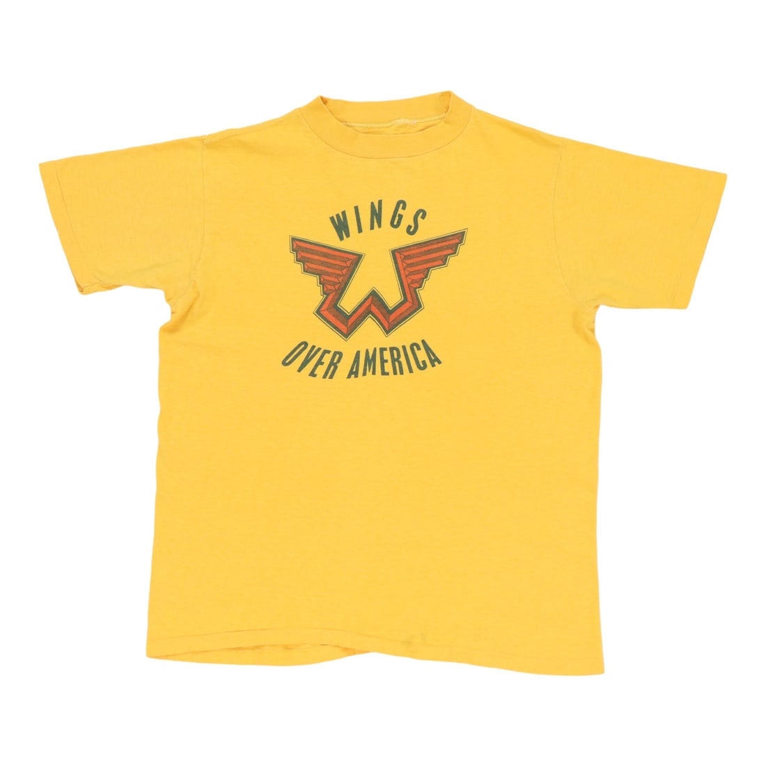 Vintage 1976 Wings Over America Yellow Cotton Concert T Shirt: Vintage 1976 Wings Over America Yellow Cotton Concert T Shirt This is an original vintage 1976 Wings Over America shirt, not a modern reproduction. The shirt features no graphics on the back and comes