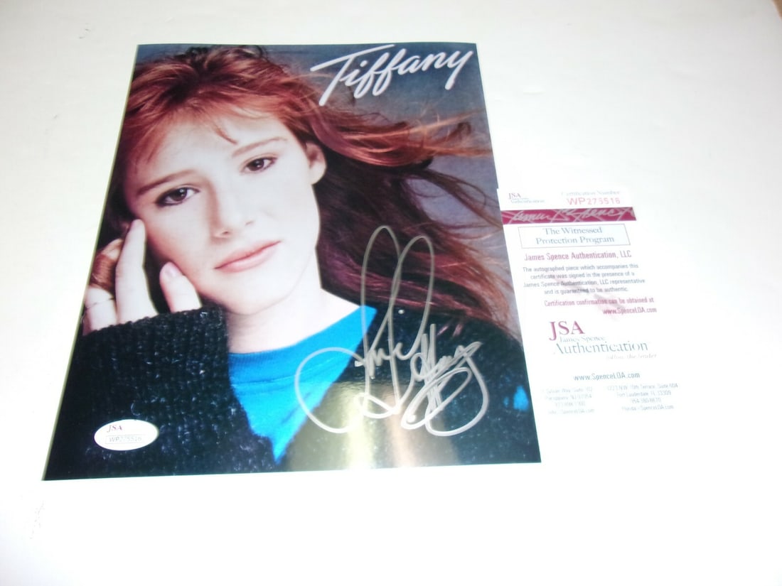 Tiffany Darwish Signed 8x10 Photo JSA COA Authentic Pop Superstar: Tiffany Darwish Signed 8x10 Photo JSA COA Authentic Pop Superstar This is an original 8x10 photo of Tiffany Darwish, a pop music superstar, featuring her signature. The photograph is authenticated by 