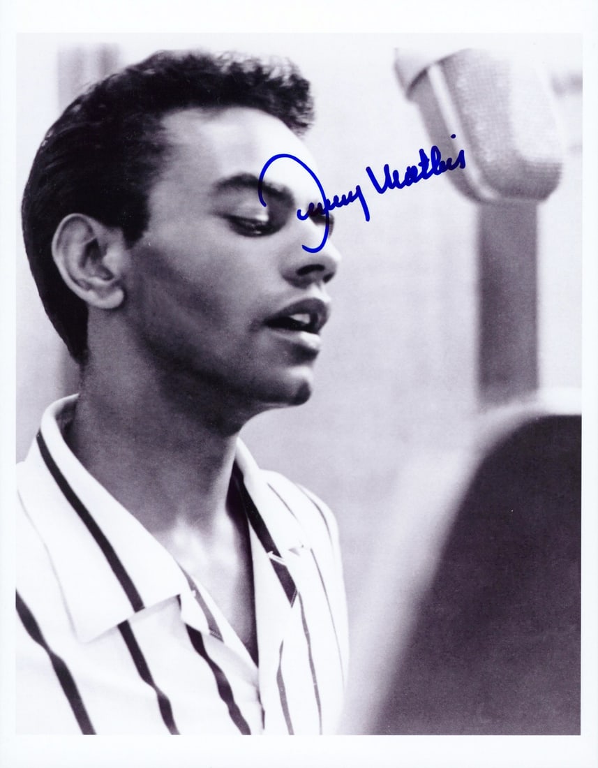 Johnny Mathis Signed Black and White 8.5x11 Photograph Beckett Authenticated: Johnny Mathis Signed Black and White 8.5x11 Photograph Beckett Authenticated This is an original 8.5 x 11 inch black and white photograph personally signed by Johnny Mathis. The autograph is authentic