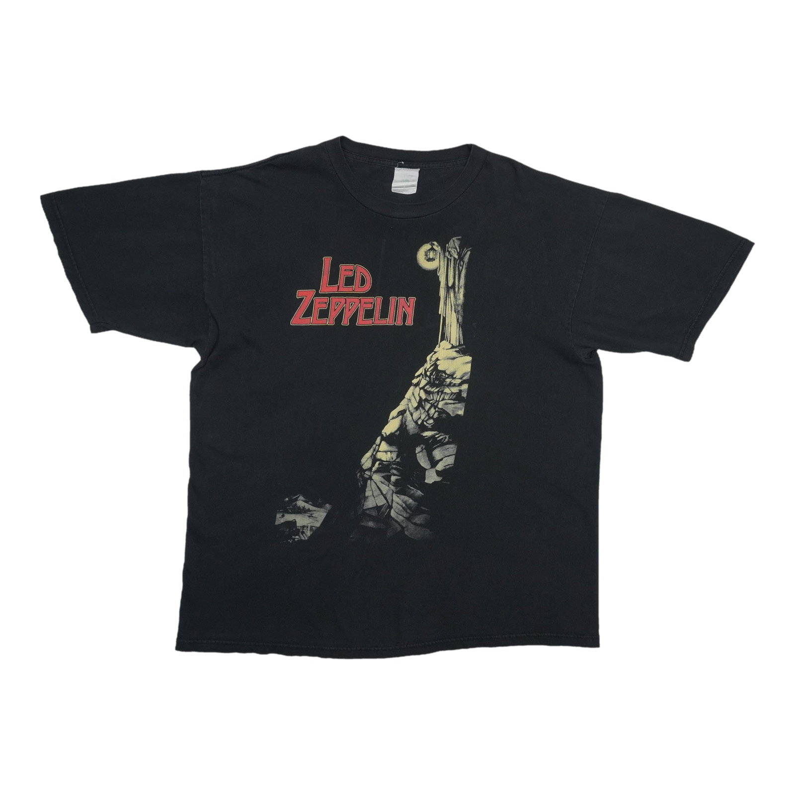 Vintage 1990s Led Zeppelin Black Cotton Shirt: Vintage 1990s Led Zeppelin Black Cotton Shirt This is an original vintage Led Zeppelin Hermit shirt from the 1990s. Made from 100% cotton, the shirt features a classic black color and is not a modern 