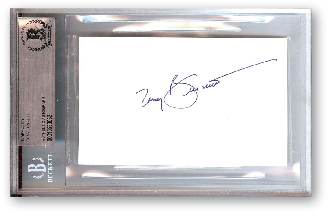 Tony Bennett Signed Index Card Beckett Authenticated 4.5 X 7: Tony Bennett Signed Index Card Beckett Authenticated 4.5 X 7 This is an authentic index card signed by the legendary singer-songwriter Tony Bennett. The card is contained in a Beckett slab case, measu