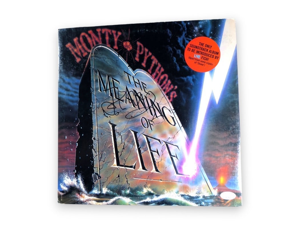 John Cleese Signed Monty Python Meaning of Life Album Cover JSA Certified: John Cleese Signed Monty Python Meaning of Life Album Cover JSA Certified Celebrate the iconic comedy of Monty Python with this autographed album cover from John Cleese. This original piece features C