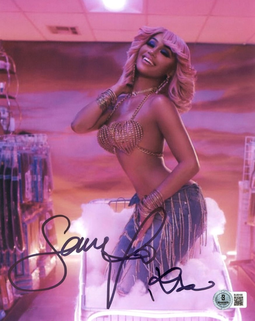 Saweetie Signed 8x10 Photo Music Video Pose Beckett Authenticated: Saweetie Signed 8x10 Photo Music Video Pose Beckett Authenticated Capture a piece of music history with this Saweetie signed 8x10 photo, showcasing her in a captivating pose from her music video. This
