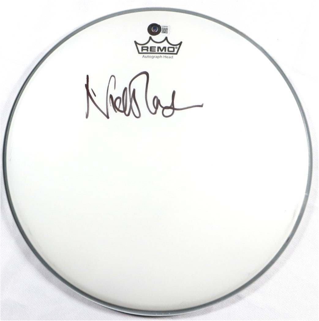 Nick Mason Autographed 14 Inch Drumhead Pink Floyd JSA Authenticated: Nick Mason Autographed 14 Inch Drumhead Pink Floyd JSA Authenticated This is an original 14" drumhead signed by Nick Mason, the legendary drummer of Pink Floyd. The autograph has been authenticated by