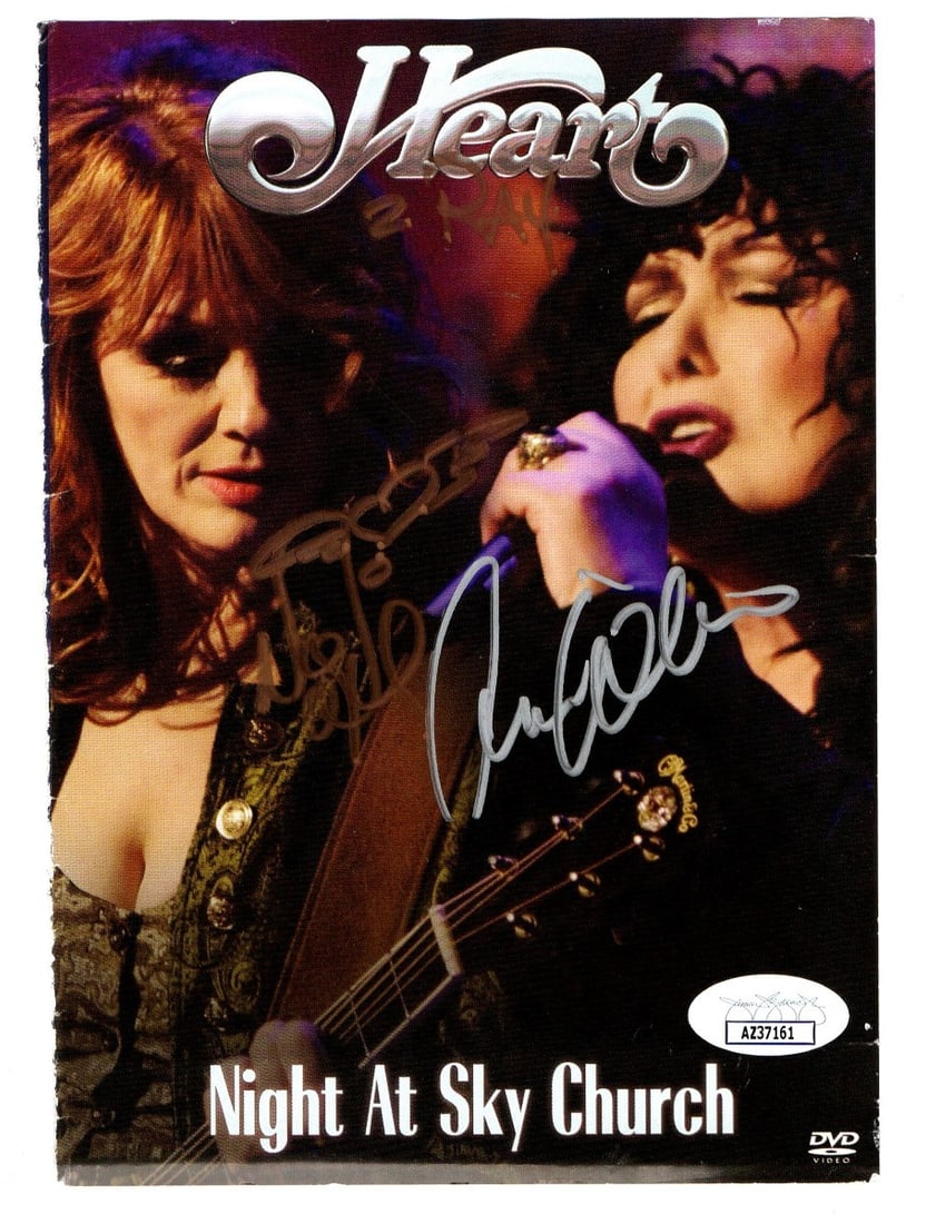 Ann Nancy Wilson Signed DVD Cover Heart JSA Authenticated: Ann Nancy Wilson Signed DVD Cover Heart JSA Authenticated This is an original autographed DVD cover featuring the signatures of Ann Wilson and Nancy Wilson from the iconic band Heart. The cover is aut