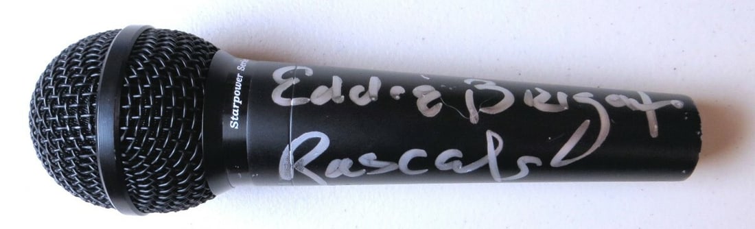 Eddie Brigati Autographed Microphone The Rascals Global Authentics: Eddie Brigati Autographed Microphone The Rascals Global Authentics This is an authentic microphone autographed by Eddie Brigati, renowned member of The Rascals. The autograph has been authenticated by
