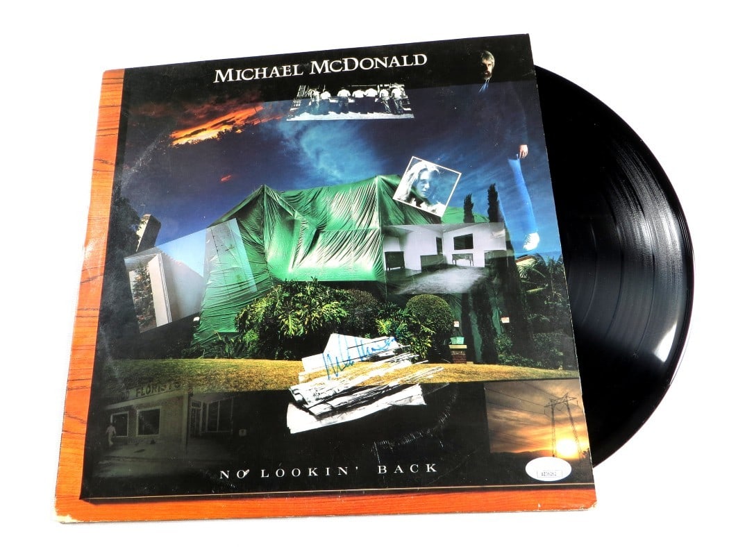 Michael McDonald Signed No Lookin' Back Album Cover JSA Authenticated: Michael McDonald Signed No Lookin' Back Album Cover JSA Authenticated This is an original autographed record album cover by Michael McDonald, featuring his iconic work, 'No Lookin' Back.' The album co