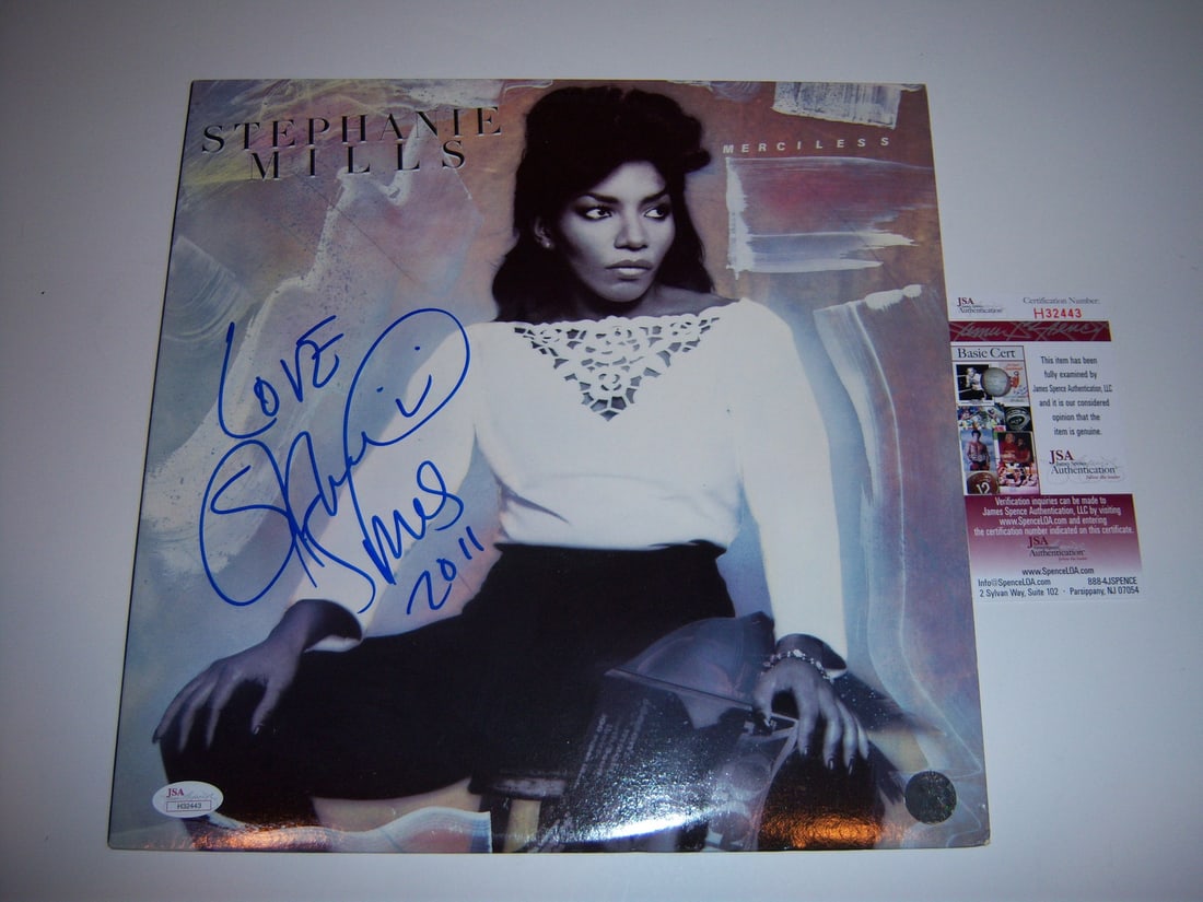 Stephanie Mills Autographed Merciless Album with JSA COA: Stephanie Mills Autographed Merciless Album with JSA COA This is a pre-owned original LP record album of "Merciless" signed by Stephanie Mills. The album comes with JSA/COA authentication, confirming 
