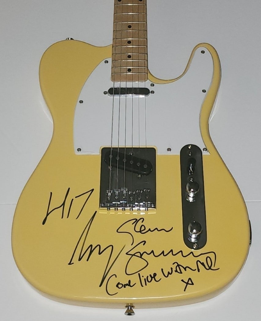 Autographed Heaven 17 Guitar Signed by Martyn Ware and Glenn Gregory JSA Authenticated: Autographed Heaven 17 Guitar Signed by Martyn Ware and Glenn Gregory JSA Authenticated This pre-owned guitar and guitar pick have been signed by Martyn Ware and Glenn Gregory of Heaven 17. The item is